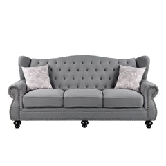 The timeless silhouette of the Hannes sofa collection makes it a great choice for your living area! With classy winged backs accented by buttonless tufting, nailhead trim on the rolled armrests, and wood bun-turned front legs, Hannes combines the best of 