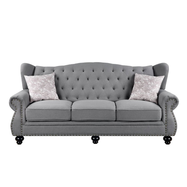 The timeless silhouette of the Hannes sofa collection makes it a great choice for your living area! With classy winged backs accented by buttonless tufting, nailhead trim on the rolled armrests, and wood bun-turned front legs, Hannes combines the best of 