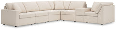 Looking cool and contemporary is great. But when it comes down to it, youâ€™re all about low-maintenance lounging. With the performance fabric on this sectional with console, cleaning spills is a breeze. Its customizable modular design caters to your ever