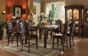 If you-'re tired of boring, uninspired counter dining sets, the Vendome counter height dining collection in cherry offers a refined alternative. Intricate carvings adorn the scrolled apron flanking the square wooden top of the table, while the table legs 