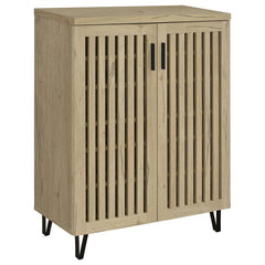 Transform your foyer or hallway with this versatile shoe cabinet, designed to keep your footwear organized and out of sight while complementing a variety of interior styles. Behind its distinctive vertical-slatted doors, multiple adjustable shelves provid