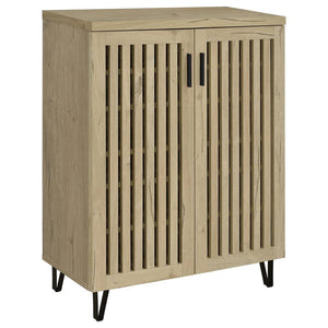 Transform your foyer or hallway with this versatile shoe cabinet, designed to keep your footwear organized and out of sight while complementing a variety of interior styles. Behind its distinctive vertical-slatted doors, multiple adjustable shelves provid