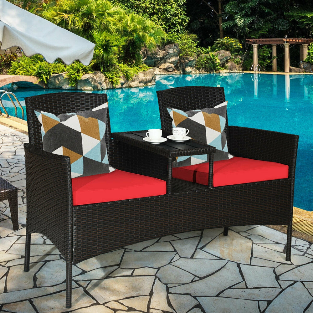 Made of high quality rattan with strong built-in frame structure<br>Poly table top is durable and safe to use<br>Trapezoid coffee table between two seats is practical<br>Cozy thick cushions double your comfy<br>The cushion cover with zipper is removable a