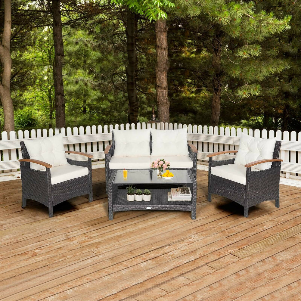 This 4-piece patio rattan conversation set will be a perfect addition to your backyard or other outdoor occasions. Â  Constructed of heavy-duty and anti-rust steel frame  all the loveseat  single sofas and coffee table can withstand strong weight. And the