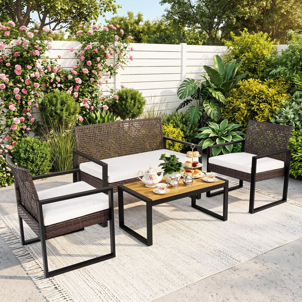 Breathable hand-woven PE rattan for weather-resistant outdoor use<br>Premium acacia wood tabletop offers natural beauty and a splinter-free surface<br>Adjustable feet on the coffee table ensure stability on uneven ground<br>High-density sponge filled cush