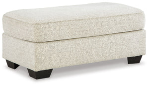 This ottoman has the corner on casual contemporary style and everyday comfort. Chic and subtly innovative, its crosshatched chenille upholstery is a forward-thinking take on fashionable neutrals. This simple, streamlined design is sure to appeal to your r