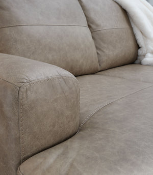  with richly neutral leather and faux leather upholstery embracing you in irresistibly soft seating. It-'s a chic