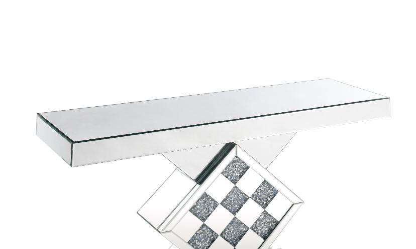 The modern glamour of the Noralie mirrored console table will brighten your foyer or bedroom. This brilliant console table features a mirrored pedestal base with faux diamond inlay, adding dimension, contrast, and shine to this functional piece. It featur