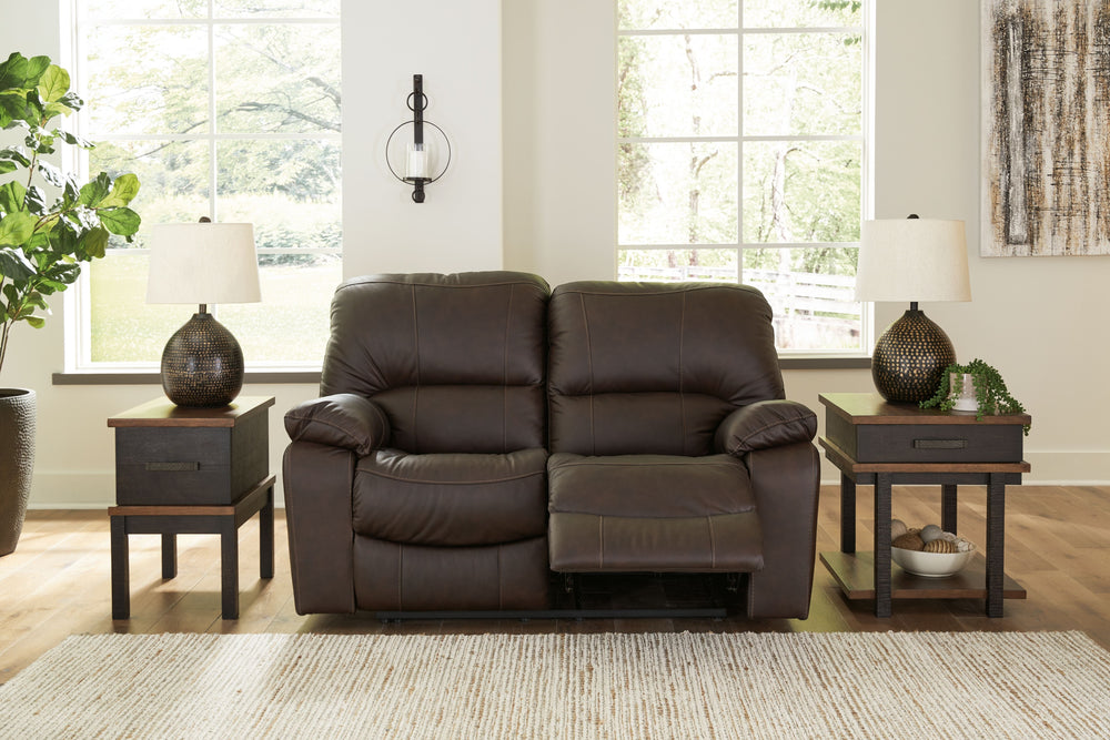 Focus on function. This practical power reclining loveseat balances contemporary character and irresistible comfort. Its affordable, expertly matched leather and faux leather upholstery keeps your style up to speed without breaking the bank. Reclining wit