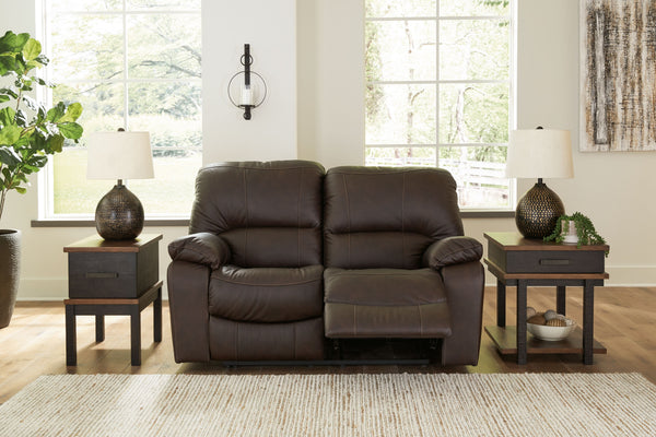  expertly matched leather and faux leather upholstery keeps your style up to speed without breaking the bank. Reclining wit
