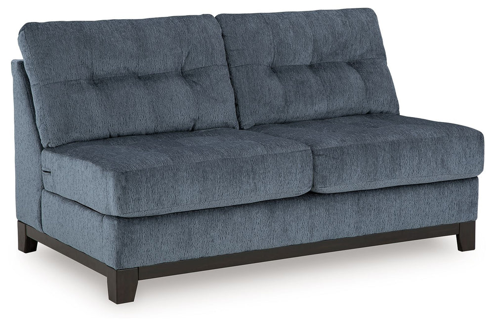 This armless loveseat is made with polyester upholstery. Pairs with other items in the series to make a sectional.<br><br><b>Additional Dimensions</b><br><ul><li>Seat depth: 23-"</li><li>Seat height: 21-"</li><li>Top of cushion to top of back: 17-"</li><l