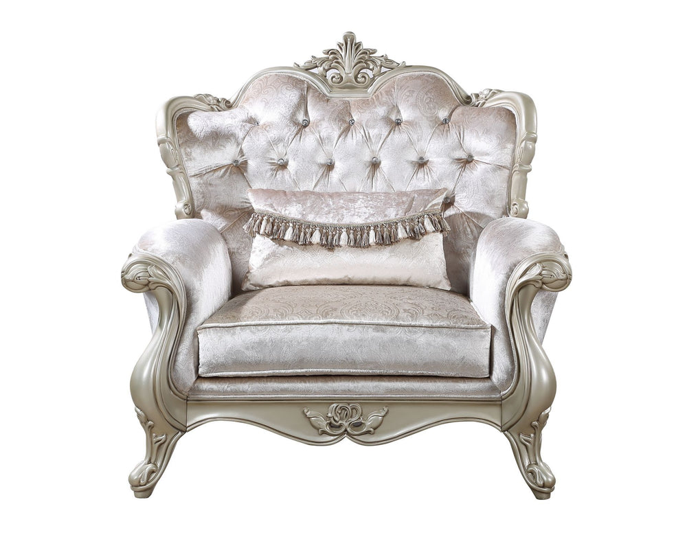 The Monique Royal Classic Arm Chair in champagne showcases heirloom-quality craftsmanship and timeless elegance. Expertly constructed from premium pine solids and adorned with durable polyurethane carvings, this chair is lightweight, moisture-resistant, a