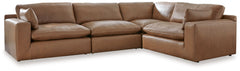 Catering to your contemporary lifestyle, this sectional is a handsome marriage of masculine and feminine sensibilities. Feather-fiber cushions and bolster pillows soften the look of its chunky, linear silhouette. A warmly hued combination of leather and f