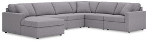 Looking cool and contemporary is great. But when it comes down to it, youâ€™re all about low-maintenance lounging. With the performance fabric on this sectional with chaise, cleaning spills is a breeze. Its customizable modular design caters to your ever-
