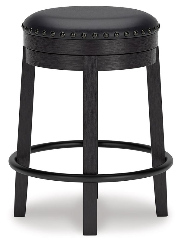  while the nailhead trim brings effortless style. Black faux leather upholstery keeps thing