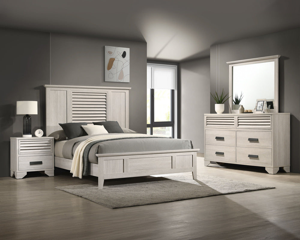 This bedroom collection radiates contemporary charm with its light wood finish and minimalist design. The bed, with its clean lines and louvered headboard, offers a modern twist on a classic design, creating a serene focal point in the room. Complementary