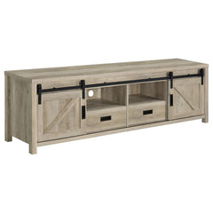 Wood-like finishes and country-inspired elements create this rustic style TV console. Keep entertainment consoles, a stereo and more tucked neatly within two open shelves toward the center. Disguised by sliding barn doors mounted on black hardware that le