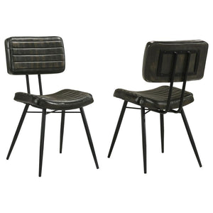 Blending industrial edge with vintage charm, this dining side chair is a striking addition to any dining space. Upholstered in hand-dyed genuine goat leather, the padded seat and backrest offer both comfort and durability. Vertical tufting details enhance