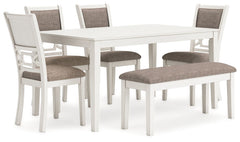 Come together for a delightful dining experience. Chic and relaxed, this dining set effortlessly captivates with its elegant simplicity. The timeless design of the table, chairs and bench pairs a crisp white hue with gray textured upholstery. It-'s a fres