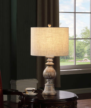  contemporary table lamp. Designed with a contoured poly frame with intricate details