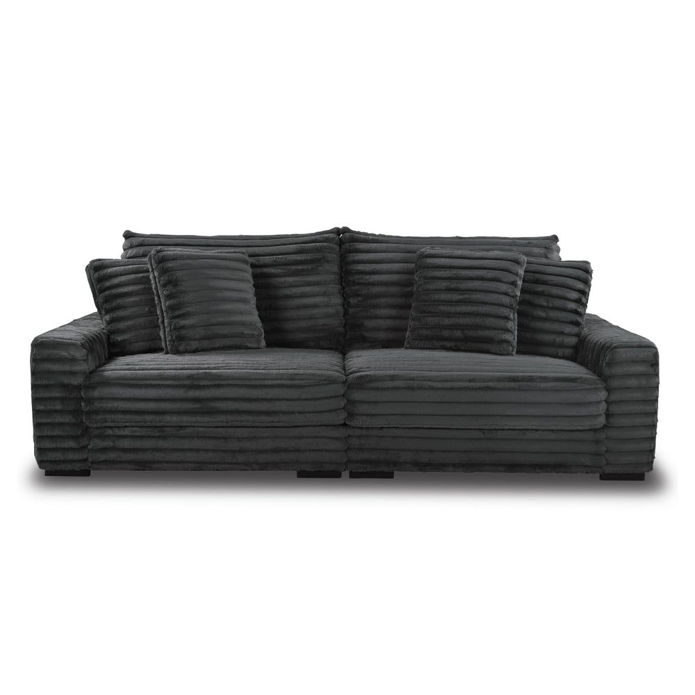 This two-piece Embrace sofa in charcoal gray is designed to transform your living space into a haven of comfort and style. Made from 100% polyester fabric with a plush, blanket-like texture, it promises ultimate relaxation. The set includes a right arm fa
