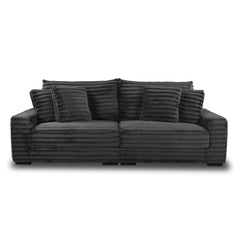 This two-piece Embrace sofa in charcoal gray is designed to transform your living space into a haven of comfort and style. Made from 100% polyester fabric with a plush, blanket-like texture, it promises ultimate relaxation. The set includes a right arm fa