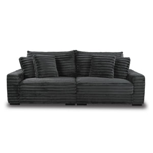 This two-piece Embrace sofa in charcoal gray is designed to transform your living space into a haven of comfort and style. Made from 100% polyester fabric with a plush, blanket-like texture, it promises ultimate relaxation. The set includes a right arm fa