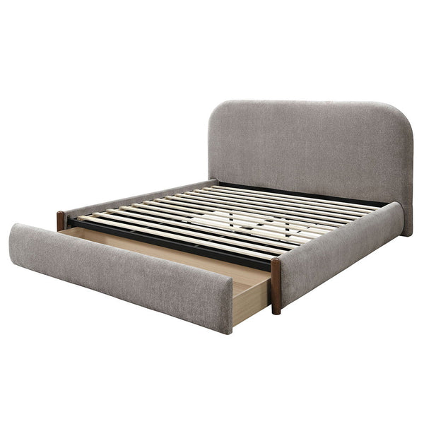 The Orane collection bed wrapped in luxurious gray fabric, combines style and functionality with a low profile footboard and convenient storage. Its full upholstered design offers a sleek, modern look, while the storage footboard provides practicality wit