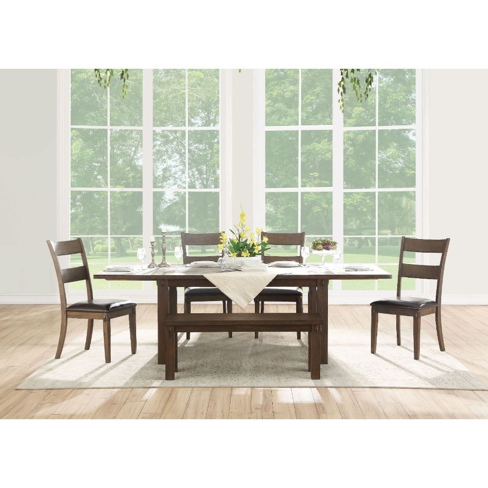 Create a beautiful interior dining space with the stylish Nabirye dining room collection. The rectangular oak wood veneer finish dining table features extension leaves to ensure plenty of space for any large gathering. This stylish and detailed collection