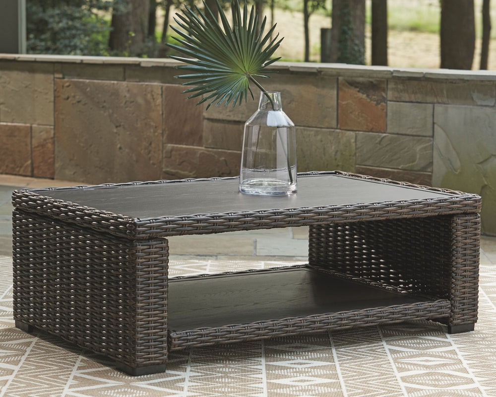 Style. Comfort. Quality. Value. This outdoor coffee table really goes to town, giving you the total package for outstanding outdoor living. Crafted to withstand the elements, this outdoor tableâ€™s resin wicker base and rust-proof aluminum frame ensure ca