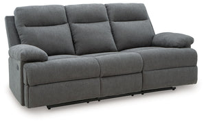 Fully upright or completely stretched out, this traditional-inspired reclining sofa caters to the art of relaxation. Super soft charcoal-colored upholstery and sumptuous cushioningâ€”made all the more indulgent with pillow top armsâ€”cradles you in comfor