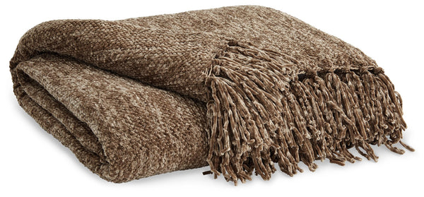A lovely layer to cozy up with, this brown throw blanket also makes a stylish statement. Whether draped over the arm of a sofa or folded at the foot of a bed, the woven texture and knotted fringe give it a homespun look that-'s relaxed and inviting.<br/><