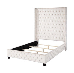 Surround yourself in plush comfort with this statement-making Fabrice bed. The dramatic extra tall, button-tufted, wingback headboard makes your bed the centerpiece of your bedroom. The upholstered headboard and rails are the perfect backdrop for bedding 