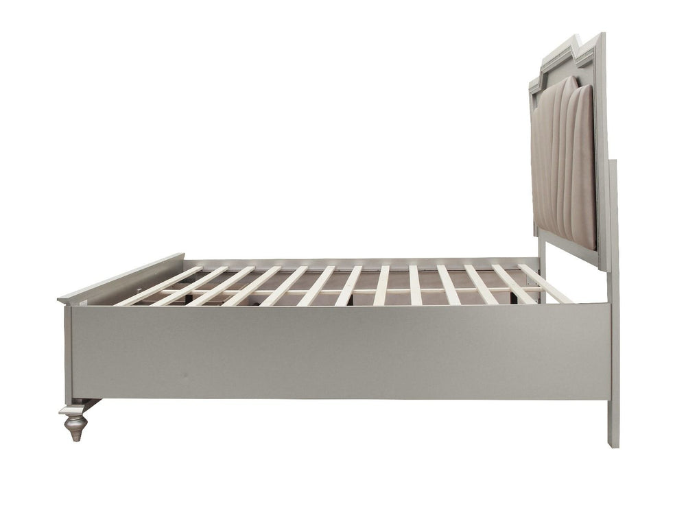 The Kaitlyn bed provides a commanding presence in any room. This contemporary storage bed features a channel tufted padded headboard and a low-profile footboard with storage drawers. Crafted with a glam look that is an ideal addition to any bedroom, the h