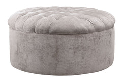 Whether your personal style is urban glam or cozy modern farmhouse, rest assured this round ottoman is an inspired choice. Irresistible elements include a sumptuously soft velvet upholstery and a tantalizing top with deep button tufting. What a shapely wa
