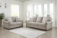 Inspired by the past but rooted firmly in the present, this living room set complements your transitional seating area. Its versatile upholstery is delightfully detailed for a subtle herringbone effect. Designer touches like decorative nailhead trim and b