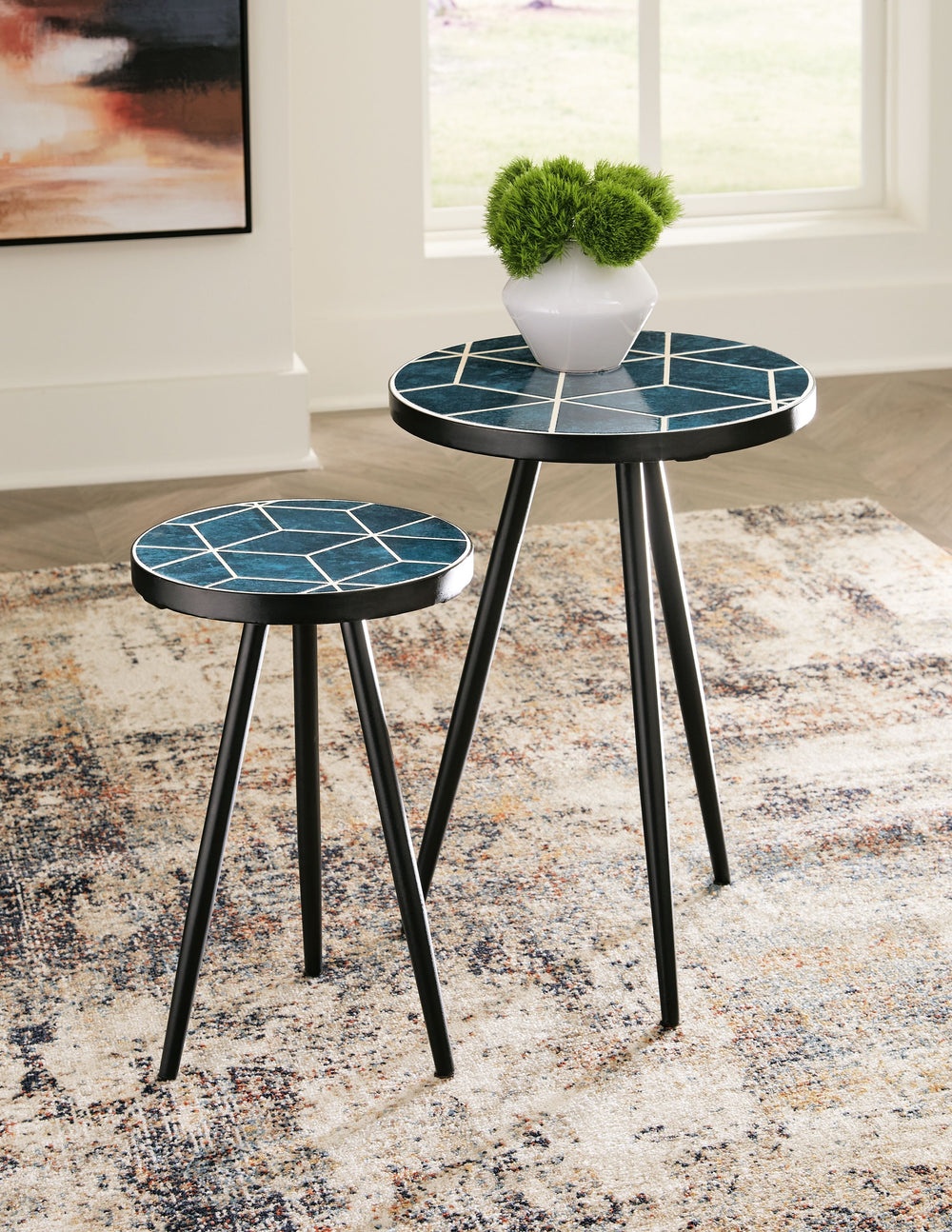 Nesting accent table set.<br><br><b>Additional Dimensions</b><br><ul><li>Accent table-large: 0-"</li><li>Accent table-small: 0-"</li></ul><br/><br/><b>Product Features</b><ul><li>Set of 2</li><li>Made with ceramic tile and metal</li><li>Two-tone teal glaz