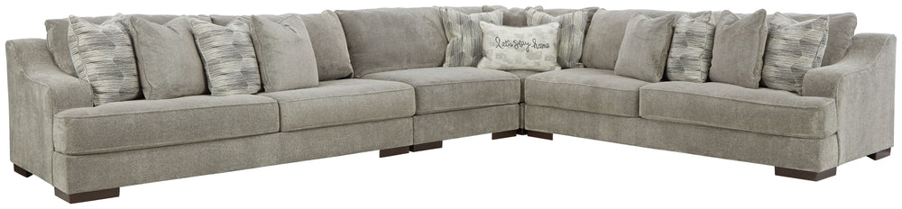 Get a leg up on comfort with this sectional. Sumptuously soft smoke gray upholstery welcomes you with open arms. A versatile performer, this stylish sectional steps in as a contemporary spot for impromptu entertaining. <h4><b>Bayless - Smoke - LAF Sofa</b