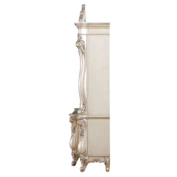  decorated with raised and oversized scrolled moldings in an antique champagne finish. This sophisticated l
