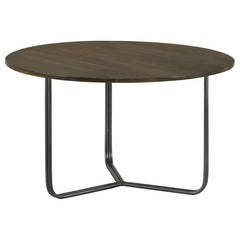Blending industrial charm with modern minimalism, this round accent table is the perfect complement to any seating arrangement. Crafted from eco-friendly solid mango wood, the spacious tabletop showcases a warm natural finish, bringing organic beauty to y