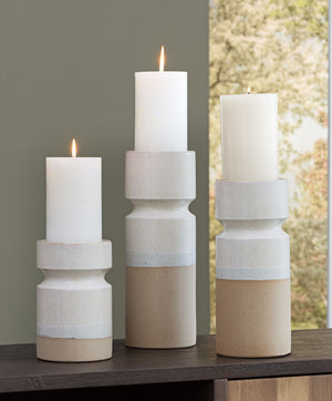  this candle holder set is one tantalizing trio. With their varying heights
