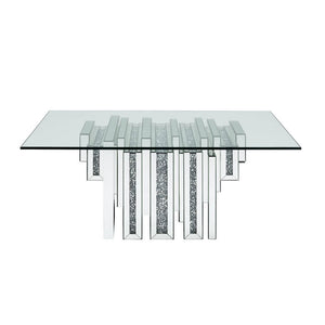 Brighten up your space with this mirrored and faux diamonds Noralie coffee table. With its unique pedestal base, this table is one your friends and family will all be envious of and will be talking about for years to come. Glam meets function with its amp