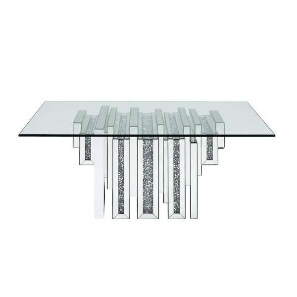 Brighten up your space with this mirrored and faux diamonds Noralie coffee table. With its unique pedestal base, this table is one your friends and family will all be envious of and will be talking about for years to come. Glam meets function with its amp