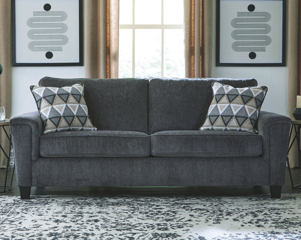 Everyone can have the best seat in the house with this sofa and loveseat. An indulgent choice with deep seats crafted for cloud-like softness, this set is the ideal merger of modern flair and classic staying power. <h4><b>Abinger - Smoke - Sofa</b></h4> <
