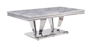 Contemporary flair breathes new life and interest into traditional design. The perfect combination of beauty and style features classic pedestal base topped with light grey marble. Updated modern touches are seen throughout the table base, such as sleek, 
