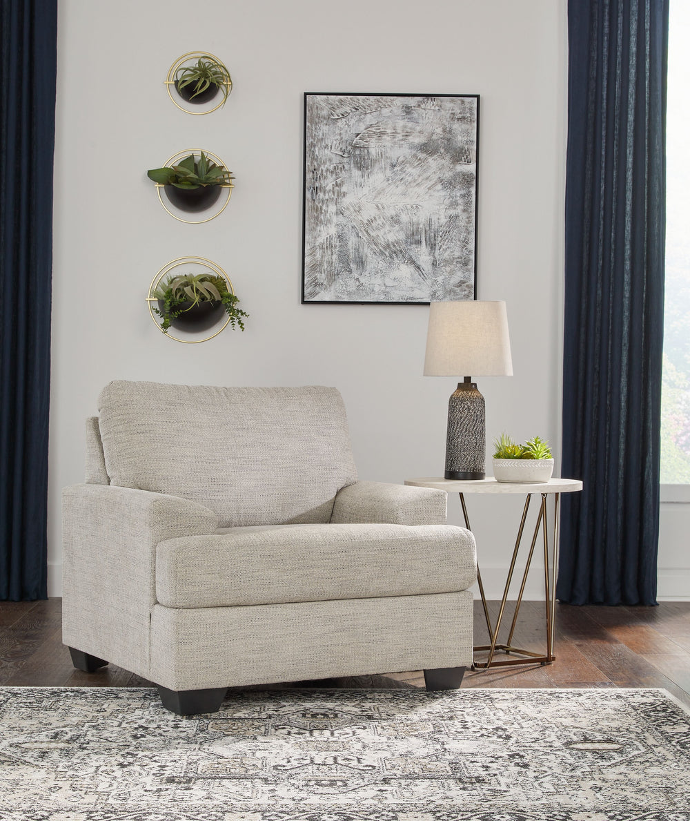 Laid-back luxury meets neutral practicality in this chair. Taking its cues from contemporary design, the clean-lined piece is outfitted with angular arms for a layer of geometric expression. A softly upholstered, sizable cushion keeps you comfortable when