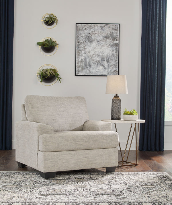  the clean-lined piece is outfitted with angular arms for a layer of geometric expression. A softly upholstered