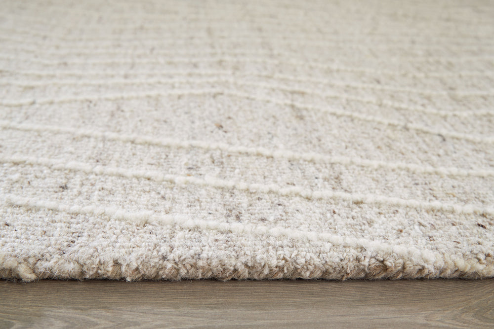 Sporting a linear abstract design, this high-style rug brings a comfortably cool vibe to contemporary spaces. Itâ€™s simplistic yet compelling in shades of gray and ivory. Simply add the rug to a living room or bedroom to instantly bring new life to your 
