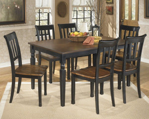 Made with select veneers and hardwood solids in a two-tone finish. Table tops and chair seats are finished in a burnished brown color. The chair frames and table bases are finished in cottage black paint. Glued and screwed corner block construction. <h4><