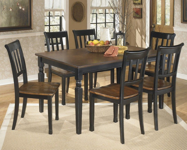 Made with select veneers and hardwood solids in a two-tone finish. Table tops and chair seats are finished in a burnished brown color. The chair frames and table bases are finished in cottage black paint. Glued and screwed corner block construction. <h4><